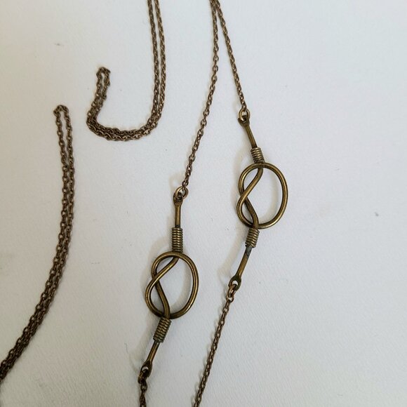 Brass long chain with knot details. - Picture 5 of 5